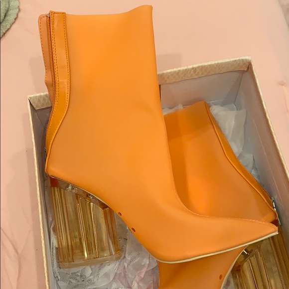 orange booties with clear heel